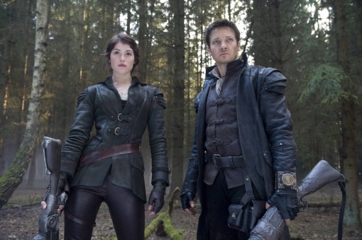 (L-R) Gretel (Arterton) and Hansel (Renner) take on witches and trolls 15 years after their escape